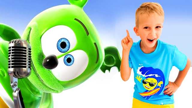 Vídeo de juguetes: Las aventuras de canto y baile del osito de goma de colores